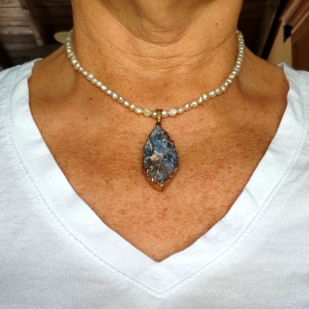 Pearls and gemstone.